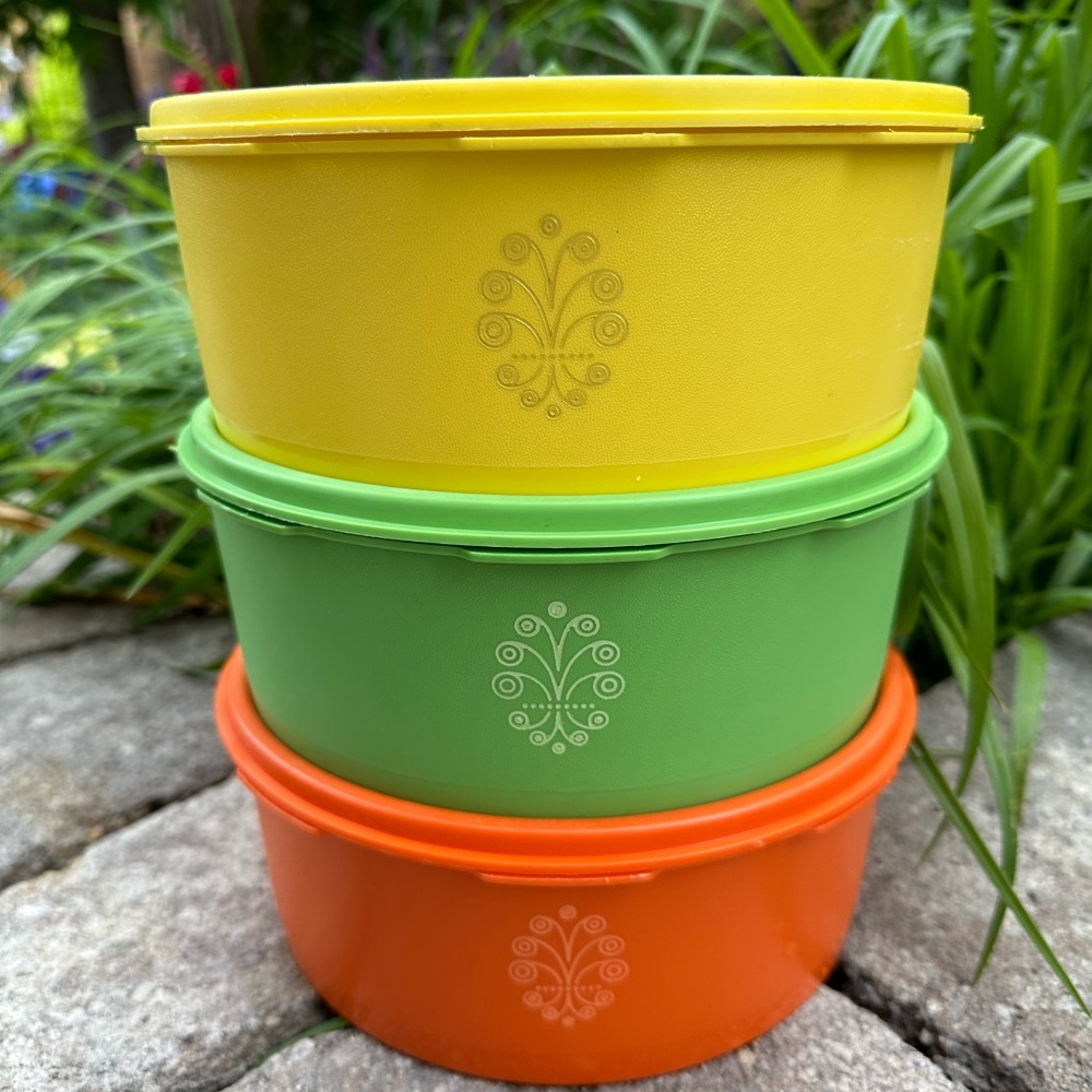Vintage Tupperware canisters, set of three. Yellow, green & orange as pictured.